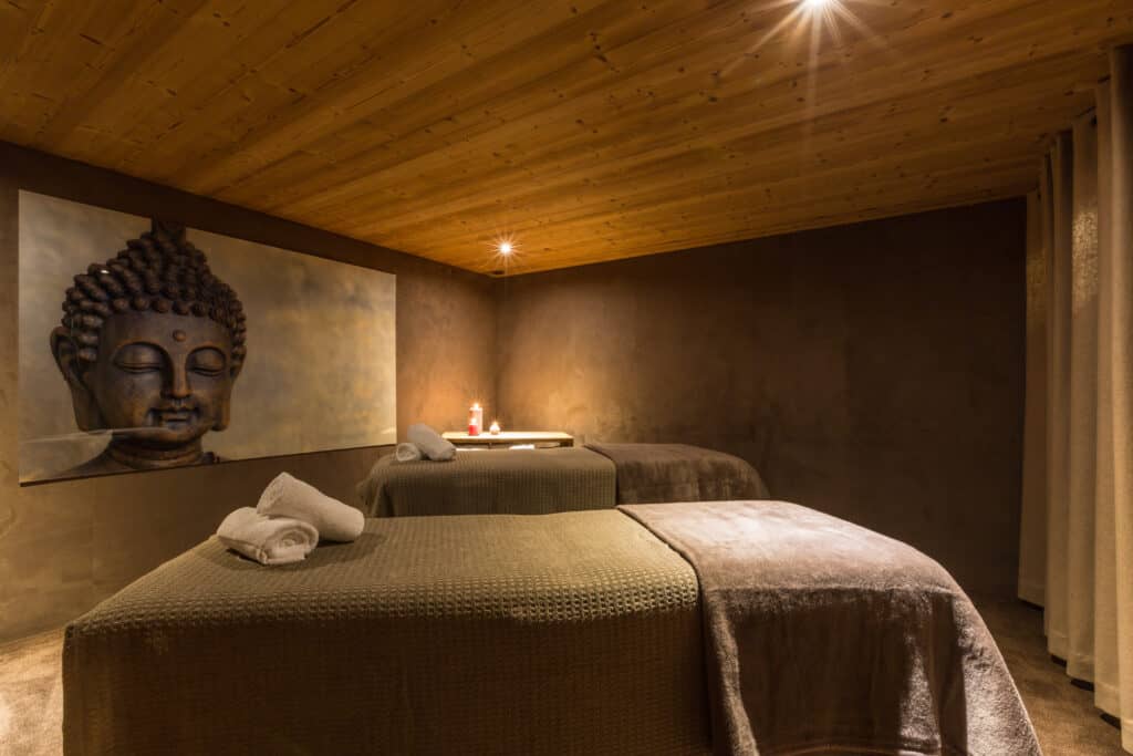 Treatment room with Buddha canvas on wall