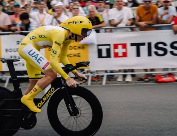 A Tour de France cyclist in front of the crowd.