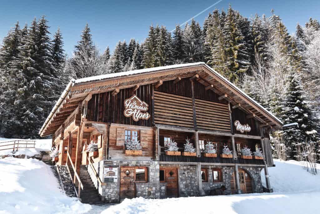 A quaint wooden chalet in the snow