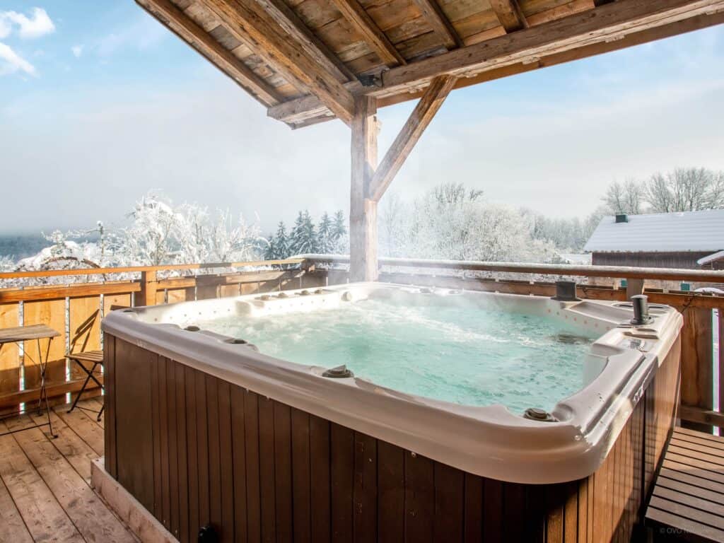 Alpine hot tub at mountain Airbnb