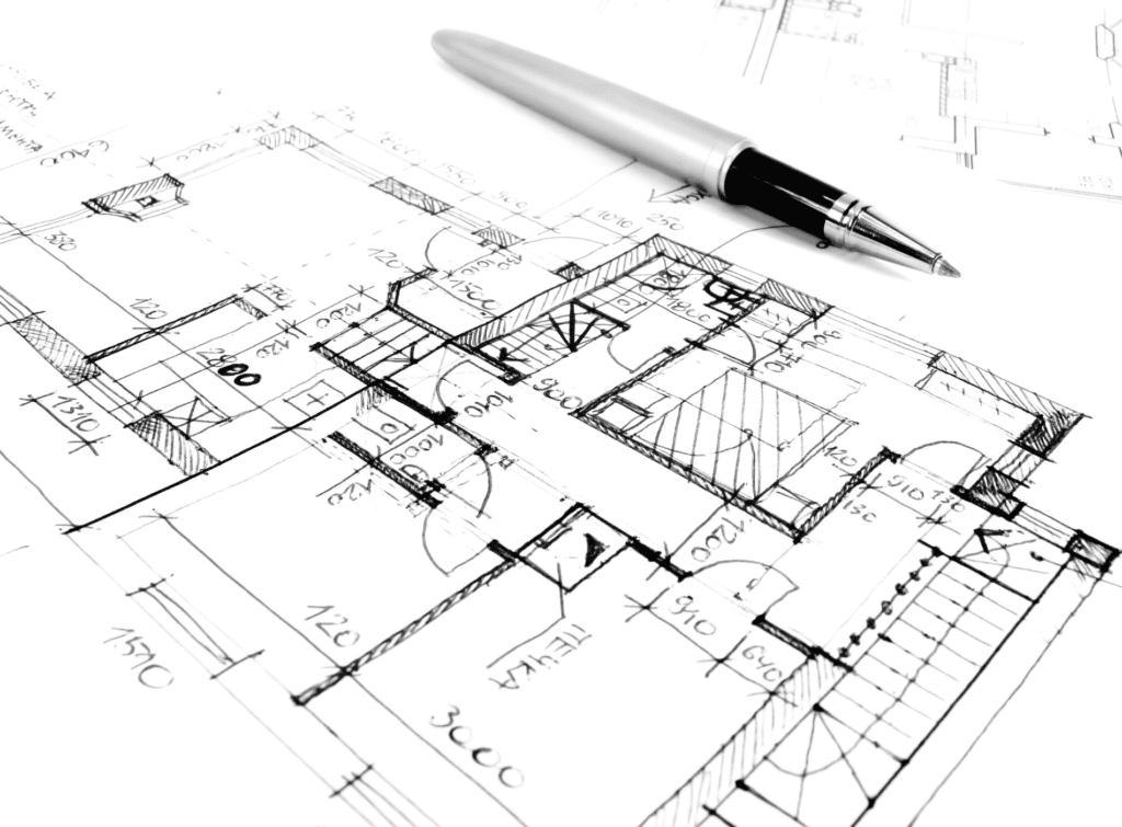 Plan de logement en noir et blanc et stylo.