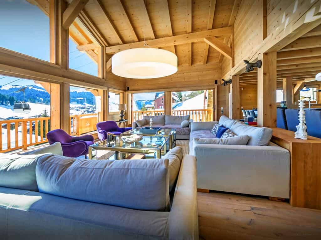 Modern alpine living room with mountain views