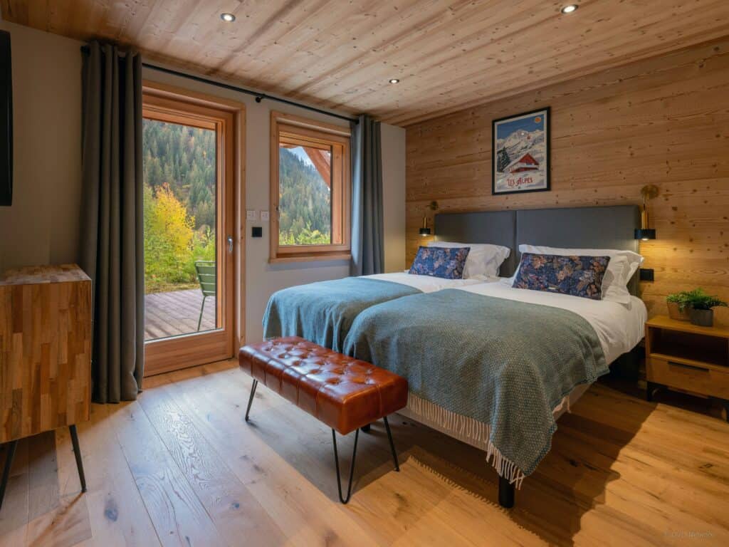 beautifully decorated wooden design room in a mountain chalet with Multipass