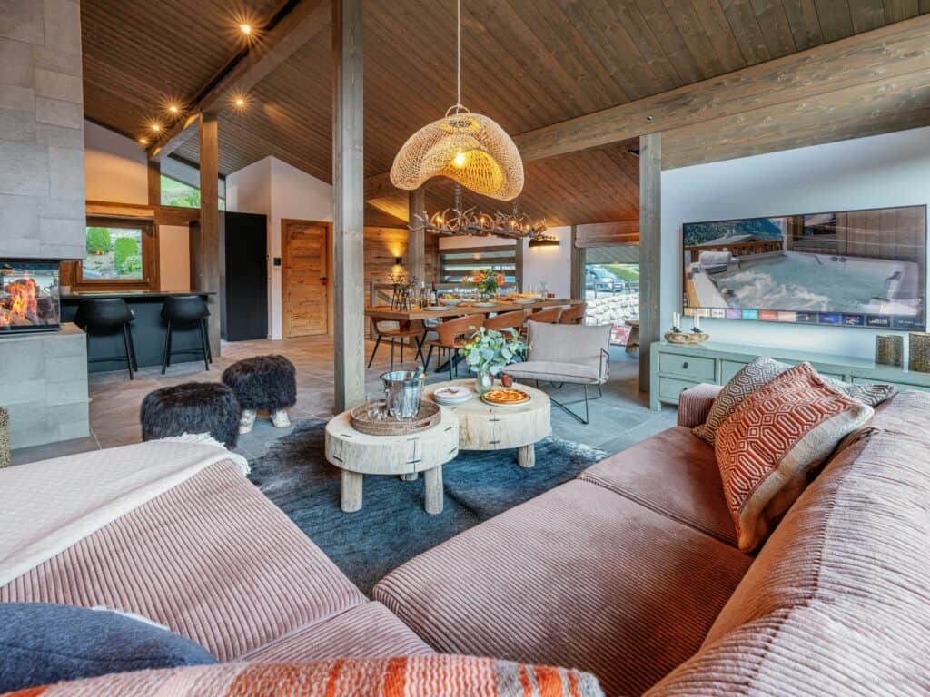 Modern alpine living room with large screen TV